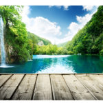 waterfall in deep forest of croatia and wood pier